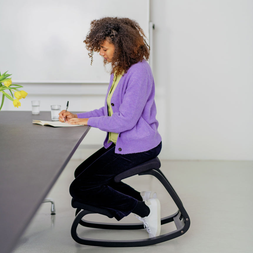 Kneeling on a online chair